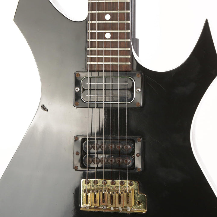 B.C. Rich USA Warlock Black with White Binding